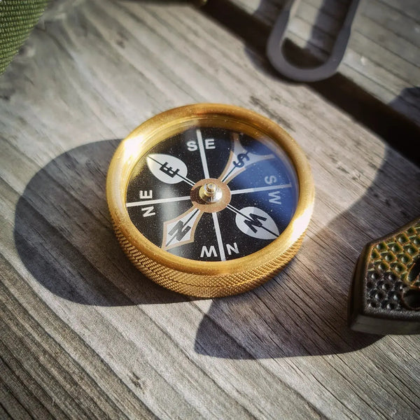 COMPASSES